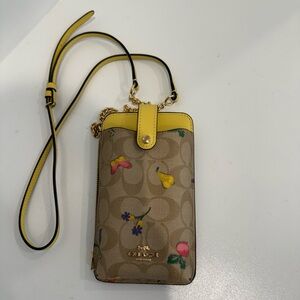 Coach phone crossbody in signature canvas with bee print 
Gently used once